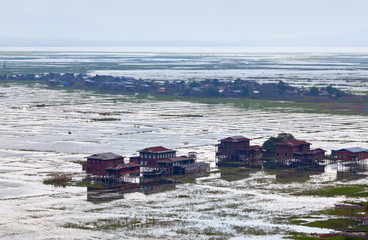 Panoramic view of Intha village on wooden piles over water on Inle lake, Shan state, Myanmar