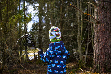 Little helper ready to rake