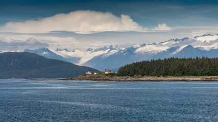 Point Retreat Lighthouse at the far northern section of Admiralty Island a few miles north of Juneau, Alaska