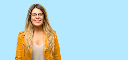 Beautiful young woman confident and happy with a big crazy smile laughing