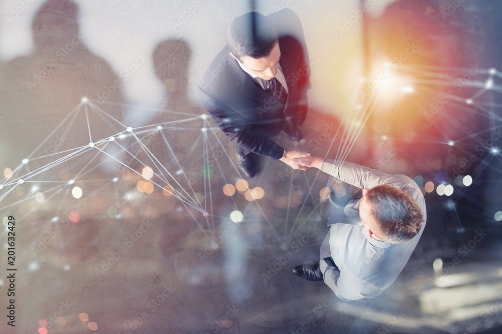 Aufkleber handshaking business person in office with network effect. concept of teamwork and partnership. doub
