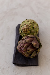Obraz premium artichokes on gray tabletop