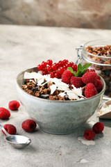 granola healthy breakfast with natural yogurt, muesli and berries