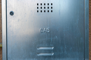 Metal gas box on residentual building close up shot on early morning.