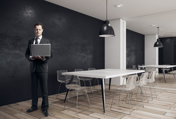 Businessman in modern conference room