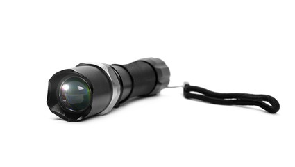 Black flashlight isolated on white