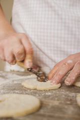 female woman artisan baker at home baking a sweet dough cookies, series from the whole process available