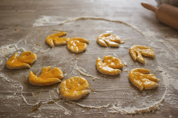 female woman artisan baker at home baking a sweet dough cookies, series from the whole process available