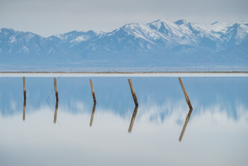 Submerged fence posts and mountains, Utah