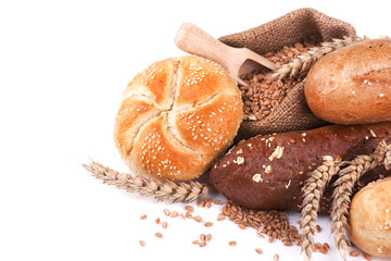 Bread and buns on napkin isolated on white background. Assorted breads isolated on a white...