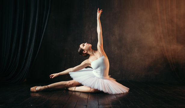 Grace of ballerina in motion on theatrical stage