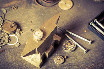 Fototapeta na wymiar Small watch to repair in watchmakers workshop