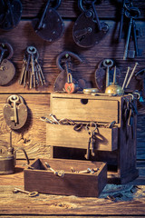 Tools, locks to repair in small locksmiths workshop