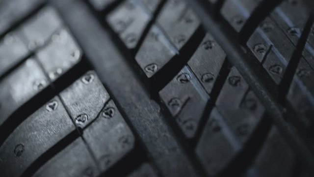 New and unused car tires spinning