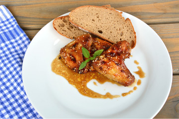 Roasted Chicken wings with honey and Rye bread.
Chicken wings menu for children
