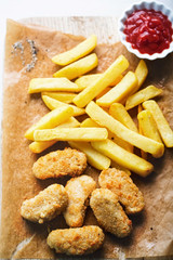 Meat free savoury flavour chicken style dippers, made with Mycoprotein, coated in breadcrumbs, served with chips