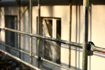 Steel scaffolding placed outside the high building for its renewal.