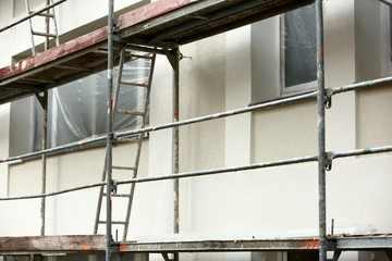 Steel scaffolding placed outside the high building for its renewal.