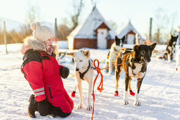 Little girl with husky dog © TravelPhotoBloggers