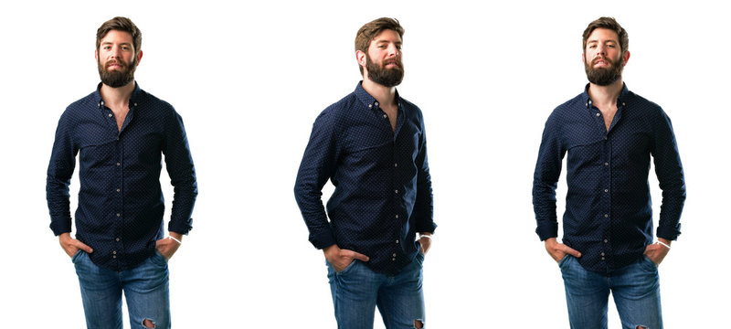Young man with beard confident and happy with a big natural smile looking at camera isolated over white background