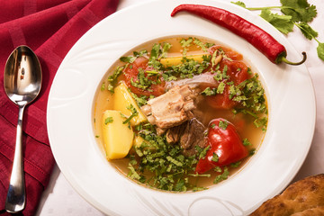 soup shurpa lamb ribs in a white plate