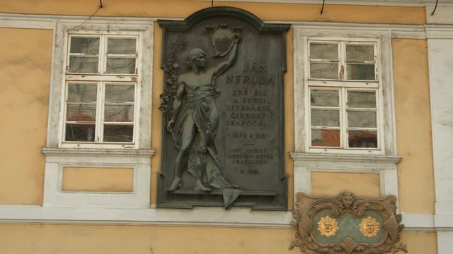 Jan Neruda commemorative plaque on a facade