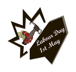 Concept on a World Labour Day 1 May, the hand holds a hammer