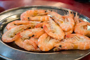 A plate of delicious and fresh stirfried king prawns.
