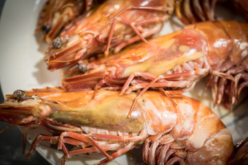 A plate of delicious and fresh stirfried king prawns.