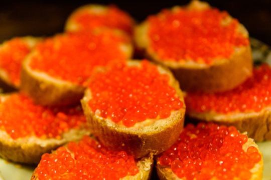 Background of the sandwiches with the red caviar