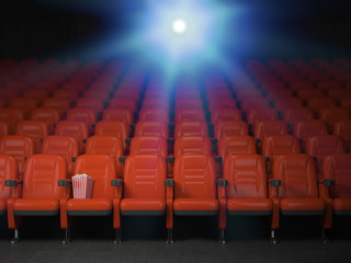Cinema and movie theater concept background. Empty rows of red seats with pop corn.