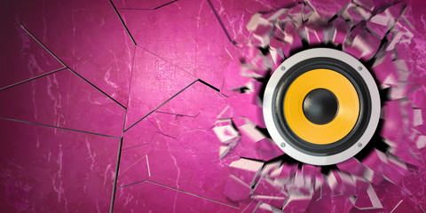 Powerful audio speakers broke concrete wall.  Explosion hole and debris. Hard rock or heavy metal energy music concept.