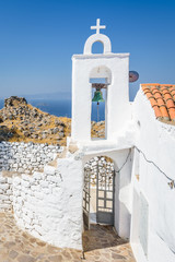 Holy greek chruch agios sant michael orthodox chapel monastery shining above the village Emporios...