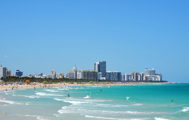 Miami Beach,Florida coastal view looking north of beaches,surf ,hotels and luxury condominiums.