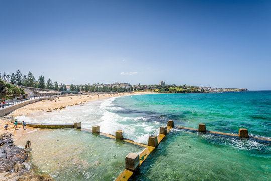 Sunny beautiful summer coast view to Sydney beach and blue Tasman Sea wild wave water and sandy white beaches perfect for surfing swimming hiking, Coogee to Bondi Walk, NSW/ Australia - 10 11 2017