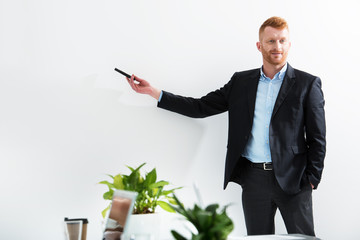 Businessman in office explain something at a training meeting