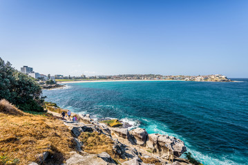 Sunny beautiful summer coast view to the famous sandy Bondi Beach and blue Tasman Sea with great...