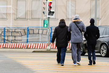 Moscow, Russia - April, 2, 2018: image of Pedestrians cross the road
