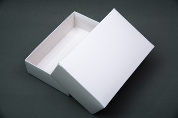 Empty Package white cardboard box or tray  for product on grey background.