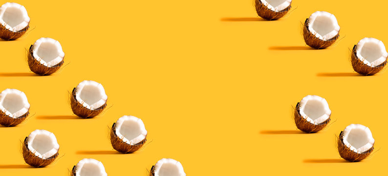 Series of coconuts on a yellow background