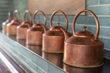 Copper teapots in a row in Chengdu, China