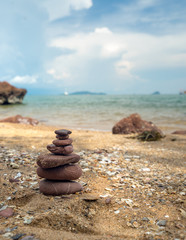 abstract stack of rock on the beach and seascape