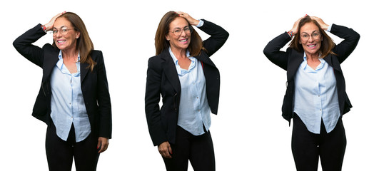 Middle age business woman terrified and nervous expressing anxiety and panic gesture, overwhelmed over white background