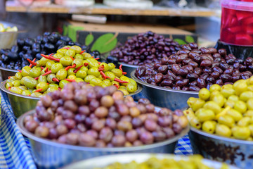 Green and black olives in the oriental market Carmel, Tel Aviv, Israel