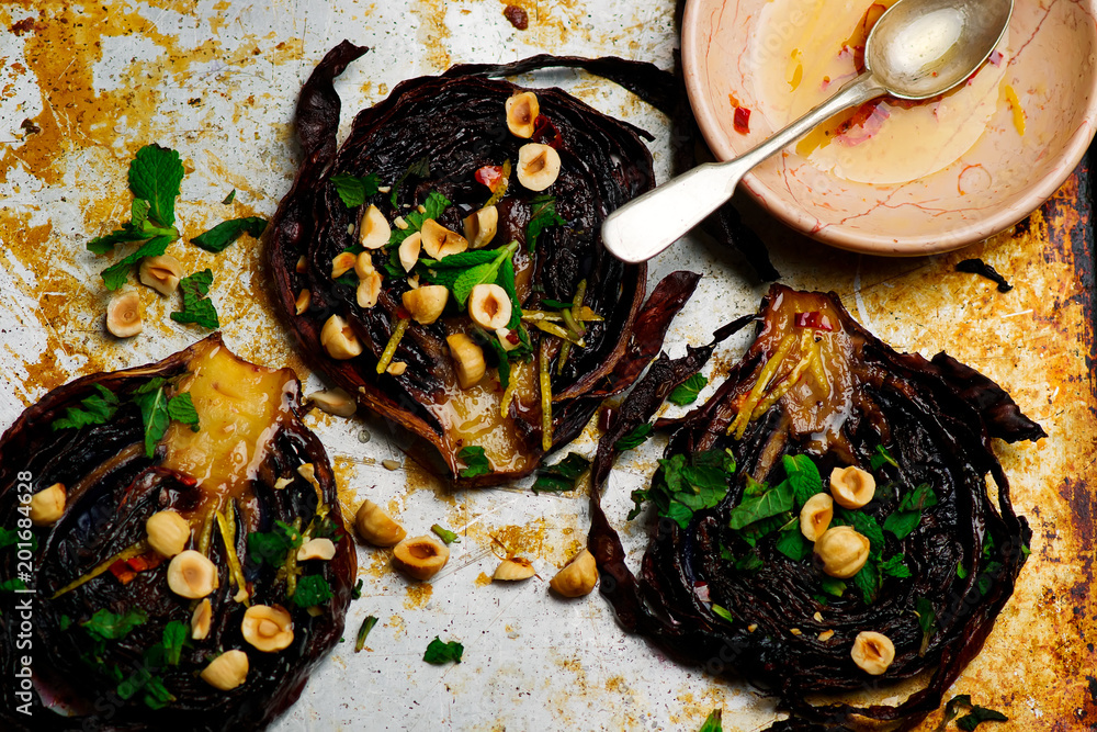 Wall mural roasted cabbage steaks with hazelnut dressing