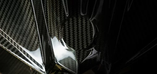 Zelfklevend Fotobehang Black carbon fiber composite material background © prakasitlalao