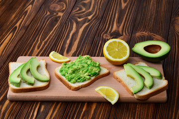 Avocado sandwich on a bread made with fresh sliced avocados from above