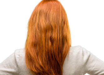 Naklejka premium Beautiful young redhead woman backside, rear view isolated over white background