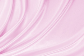 Smooth elegant pink silk or satin texture as wedding background. Luxurious valentine day background design