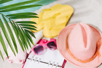 Summer vacation travel accessories and fashion on white background